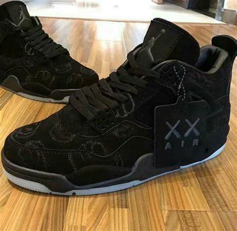 jordan 4 kaws black price.